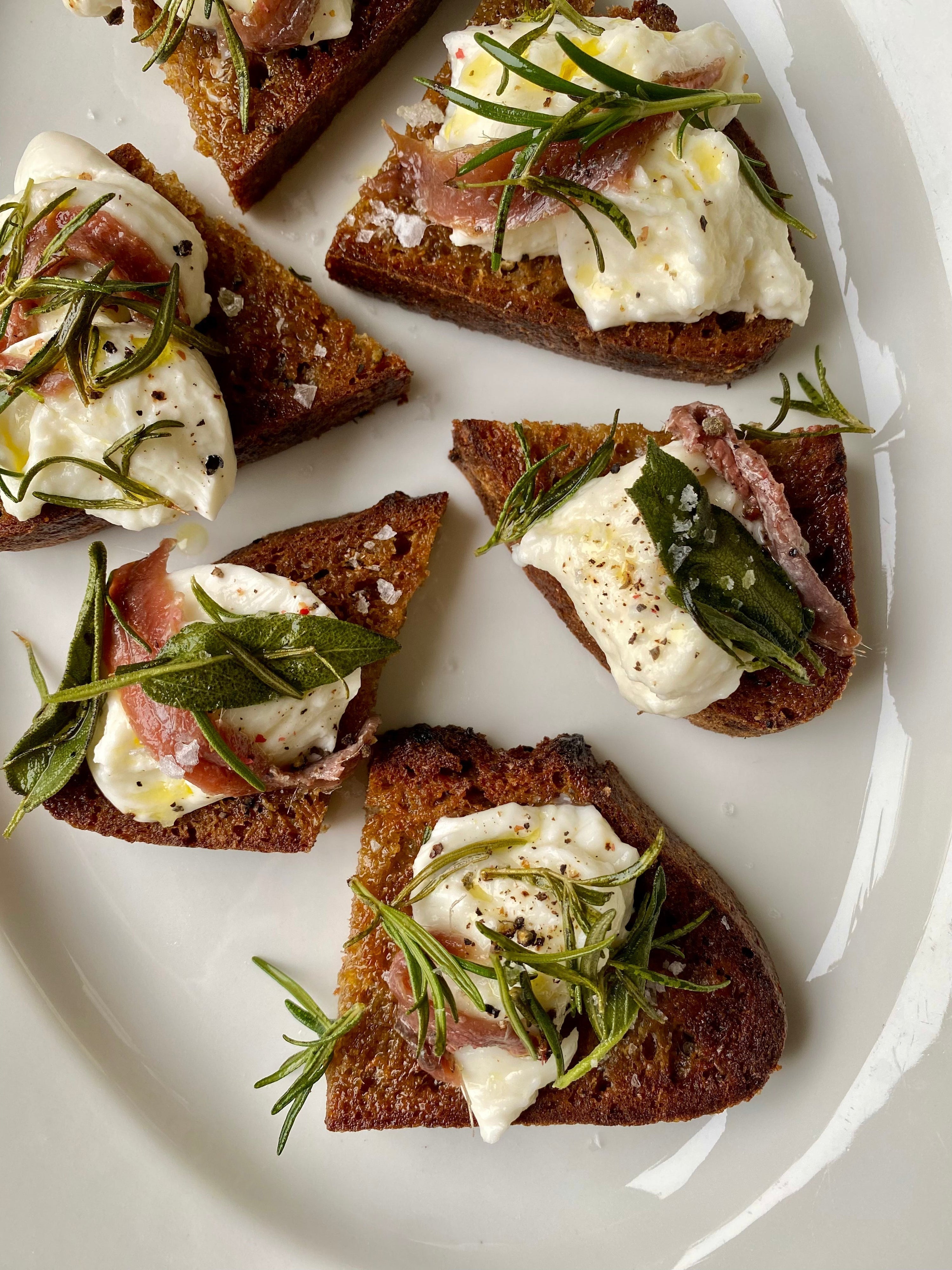 Olive oil fried bread with mozzarella and winter herbs - by Florence