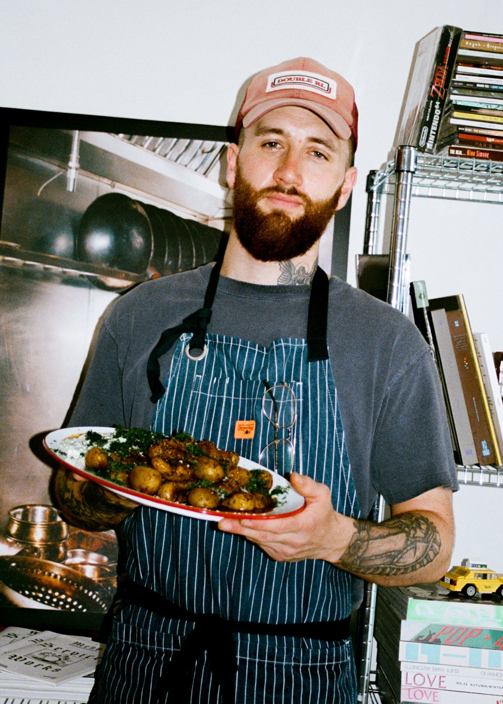 Marcus Patrick Brown in his kitchen with Honest Toil olive oil
